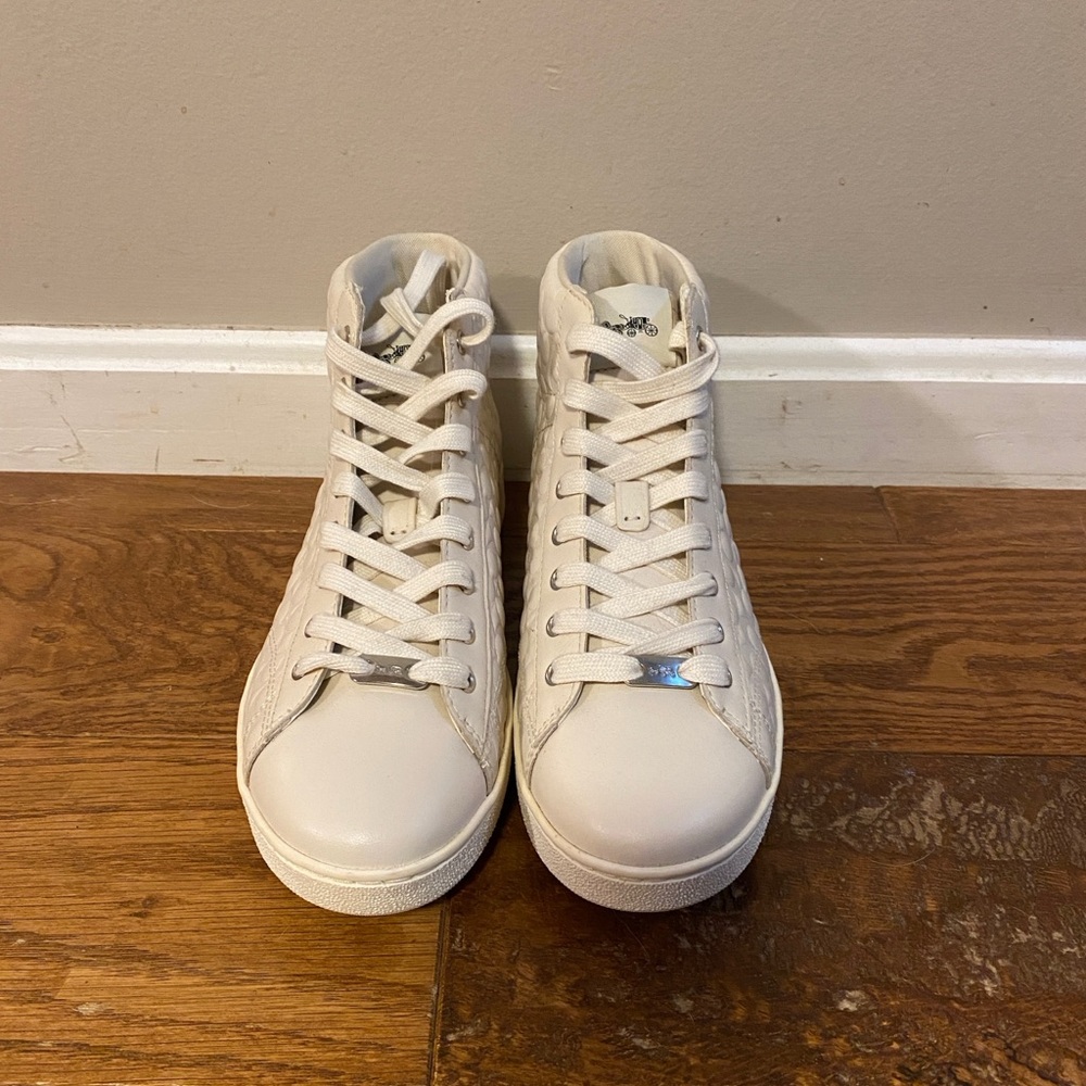 White leather high-top Coach sneakers